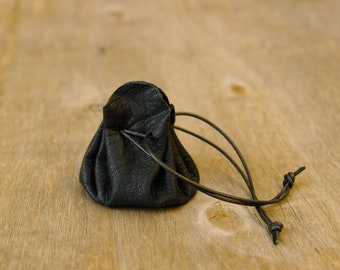 Mini leather bag (approx. 6 cm base diameter), pouch for children made of black, shiny leather