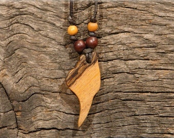 Wooden pendant made of Bocote with wooden beads in the shape of a claw