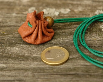 Micro leather bag (approx. 3 cm base diameter) made of brown leather with green leather strap for hanging rings, pendants, coins