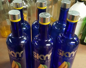 1 or 3 or 6 or 12  Skyy mango bottles liters
