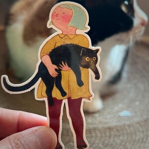 Grote sticker: een meisje en haar kat