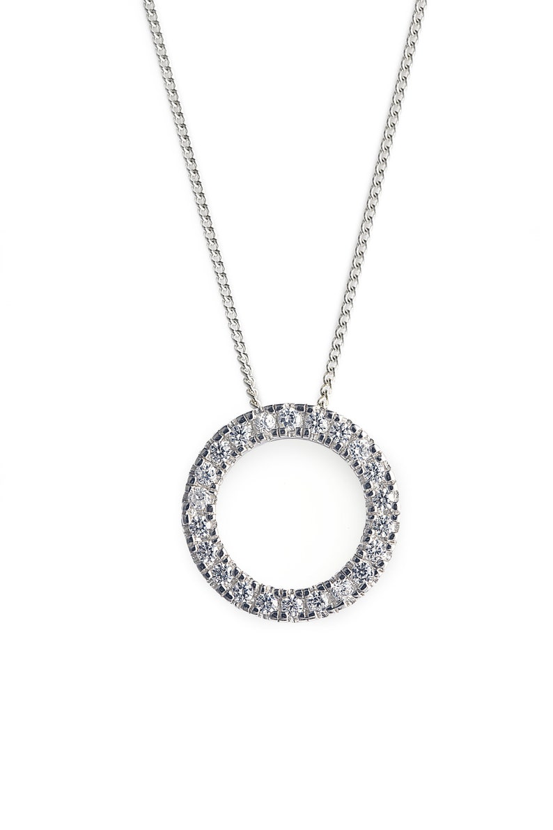 Diamond Encrusted O Bliss Pendant with Cubic Zirconia Stones and comes with Silver Chain