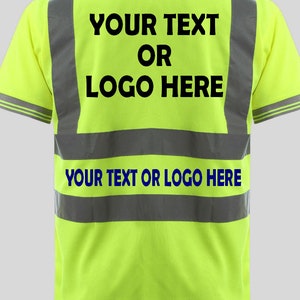 May include: A bright yellow polo shirt with reflective silver stripes. The back of the shirt has the text "YOUR TEXT OR LOGO HERE" printed in black.