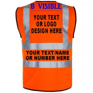 May include: Orange safety vest with reflective strips. The vest has black text that says "B VISIBLE", "YOUR TEXT OR LOGO DESIGN HERE", and "YOUR TEXT/NAME OR NUMBER HERE".