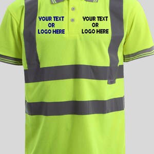 May include: A bright yellow polo shirt with reflective gray and silver stripes. The shirt has a collar and short sleeves. The text "YOUR TEXT OR LOGO HERE" is printed on the front of the shirt.