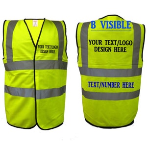 May include: A bright yellow safety vest with reflective strips. The vest has a black zipper and two black straps. The text "YOUR TEXT/LOGO DESIGN HERE" is printed on the front of the vest. The text "B VISIBLE YOUR TEXT/LOGO DESIGN HERE TEXT/NUMBER HERE" is printed on the back of the vest.