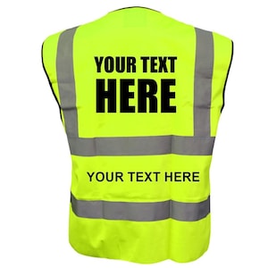 May include: A bright yellow safety vest with reflective silver stripes. The vest has black text that says "YOUR TEXT HERE" on the front and back.