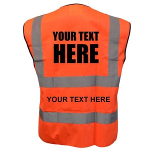 May include: Orange safety vest with reflective strips and black text that says "YOUR TEXT HERE" on the front and back.