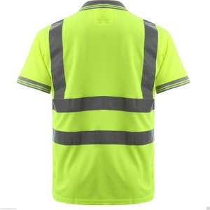 May include: A bright yellow safety polo shirt with reflective silver stripes. The shirt has a collared neckline and short sleeves.