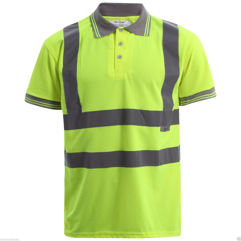 May include: A bright yellow short-sleeved polo shirt with reflective gray stripes. The shirt has a button-up collar and a small label that says "KAHON" on the collar.