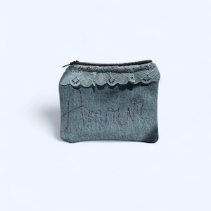 Lined denim coin pouch with “Amour” embroidered and lace trim.