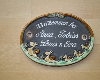 Türschild kleine Schneckenfamilie