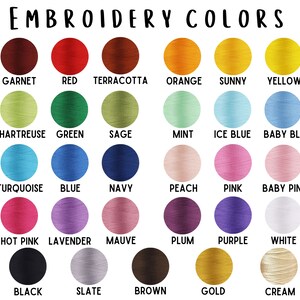 May include: A chart of embroidery floss colors with names for each color. The colors include garnet, red, terracotta, orange, sunny yellow, chartreuse, green, sage, mint, ice blue, baby blue, turquoise, blue, navy, peach, pink, baby pink, hot pink, lavender, mauve, plum, purple, white, black, slate, brown, gold, and cream.