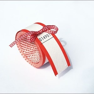Lucky tickets blank, red and white roll of 100