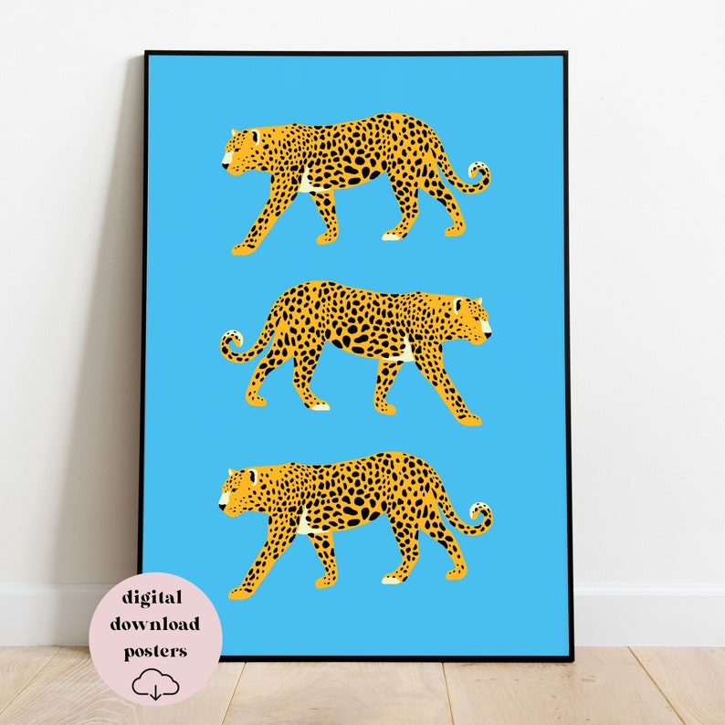 May include: Three yellow and black leopard print illustrations on a light blue background. The leopards are walking in a row, facing the right side of the image.