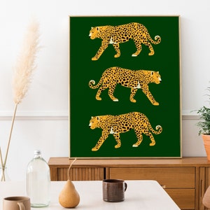 May include: A digital art print featuring three stylized leopards in yellow and orange on a dark green background.