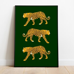 May include: Three stylized leopards in yellow and orange with black spots are walking in a row against a dark green background.