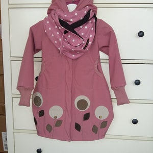 Softshell coat in antique pink with many applications