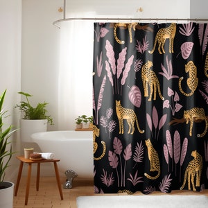May include: Black shower curtain with a repeating pattern of pink and green tropical leaves and yellow leopards.