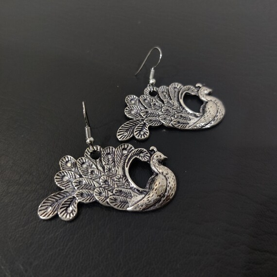 Oxidized peacock earrings discount