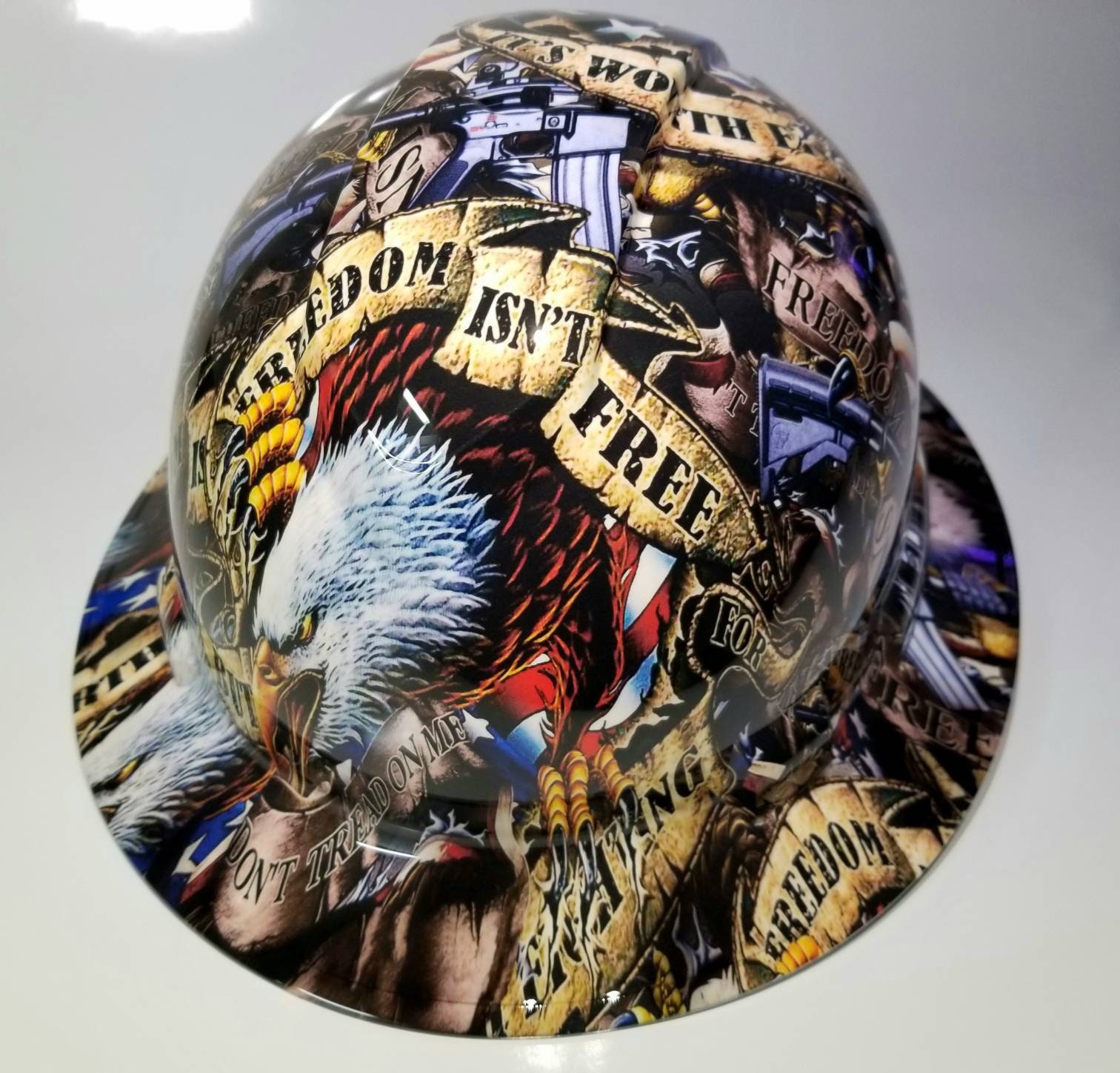 Full brim hydro dipped custom hard hat in FREEDOM ISNT FREE