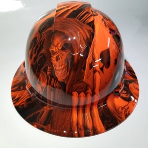Full brim hydro dipped custom hard hat in orange ace of  skulls osha approved