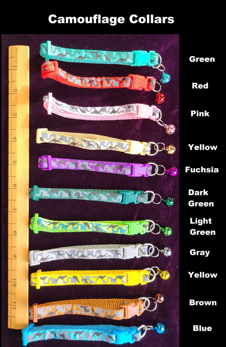 May include: A set of 10 camouflage cat collars with different coloured trim and a bell on each. The colours are green, red, pink, yellow, fuchsia, dark green, light green, grey, yellow, and blue.