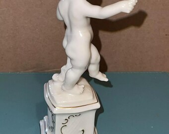 Rare Hutschenreuther Porcelain Cherub Figurine Holding A Flower Nice