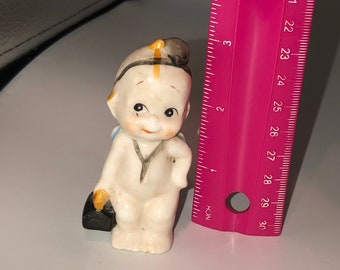 Adorable vintage ceramic figurine baby as a doctor !