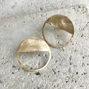 round stud earrings with brass cut-out image 1