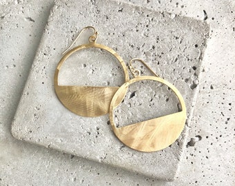 Brass earrings with cut out