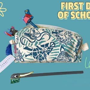 Colorful screen-printed pencil case featuring safari animals from Africa&#39;s wilderness! Animal-patterned pencil case / animal-themed school case for children