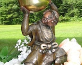 Antique Japanese Meiji Bronze Mixed Metal Figure Holding a Gilded Singing Bowl on Wooden Base