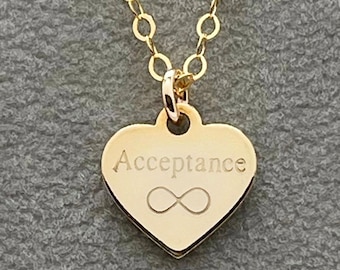 Infinity symbol gold heart chain necklace with the word "Acceptance" for autism acceptance