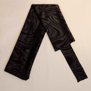 Black Swirls Tail Bag