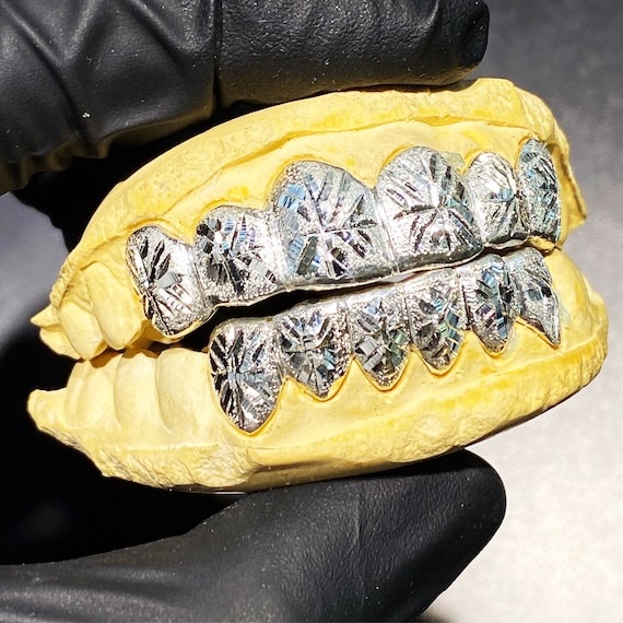 Starburst cut grillz sale