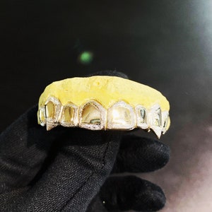 6 teeth (extended fangs, outside trim diamond dust, inside trim solid)