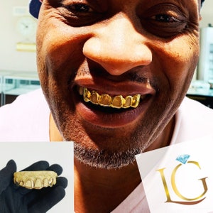 6 teeth (Solid fangs, inner 4 open face)