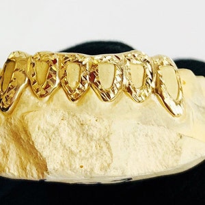 6 teeth (Open face with diamond cuts)