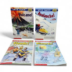 May include: Four children's books from the "Wild Earth" and "Wild Weather" series are displayed. The titles are "Volcano!", "Avalanche!", "Floods!", and "Blizzards!". Each book features colorful illustrations of the natural events. The books are published by Scholastic.