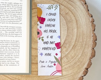 May include: A white bookmark with pink, yellow, and green floral illustrations. The bookmark features a quote from Jane Austen's Pride and Prejudice: "I could easily forgive his pride, if he had not mortified mine."