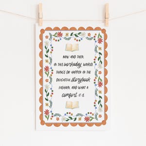 May include: A framed print with a white background and a decorative border. The border is composed of orange scalloped edges, floral and leaf accents. The print features the text "NOW AND THEN, IN THIS WORKADAY WORLD. THINGS DO HAPPEN IN THE DELIGHTFUL STORYBOOK FASHION, AND WHAT A COMFORT IT IS."
