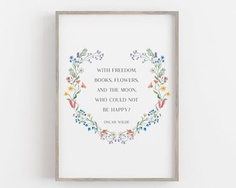 May include: A printable quote by Oscar Wilde surrounded by a floral wreath. The quote reads: "With freedom, books, flowers, and the moon, who could not be happy?"