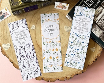 May include: Three bookmarks with floral designs and quotes from classic novels. The bookmarks feature quotes from "Wuthering Heights", "Jane Eyre", and "Agnes Grey".