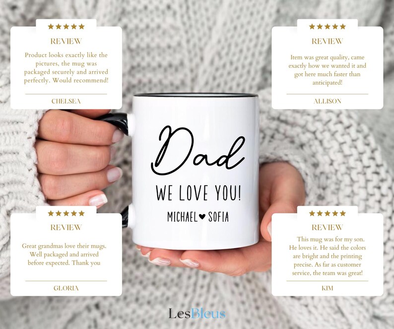 May include: White ceramic mug with black handle and rim, featuring the words "Dad WE LOVE YOU!" in black script, along with the names "Michael & Sofia." The mug is held by a person.