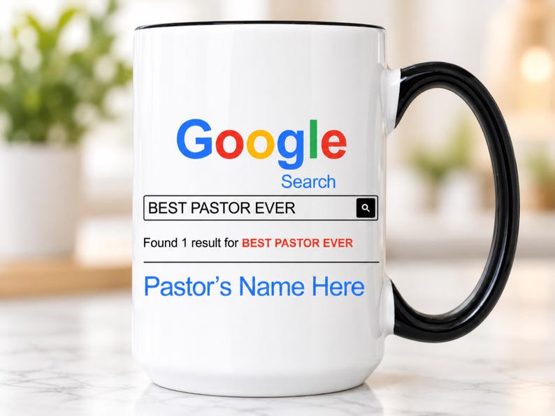 May include: A white ceramic mug with a black handle and rim featuring a Google Search bar graphic. The text reads BEST PASTOR EVER in the search field, followed by Found 1 result for BEST PASTOR EVER and the placeholder text Pastor's Name Here.