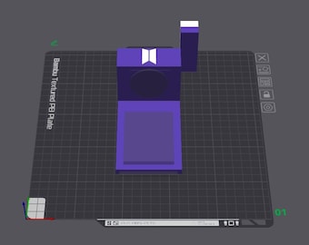 May include: A 3D-rendered, geometric object in shades of purple and white. The design includes a rectangular base, a central box with a circular cutout, and a vertical rectangular element. The object sits on a textured gray surface.