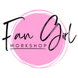 May include: A logo featuring the words "Fan Girl Workshop" in black script. The text is set against a pink circle with a white, textured outline. The background is white.
