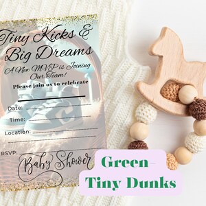 May include: A baby shower invitation featuring a blue and white baby shoe in a basket. The invitation reads "Tiny Kicks & Big Dreams" and "A New MVP is Joining Our Team!" with a gold glitter background. The text "Baby Shower" is written in cursive with gold glitter accents. The text "Green Tiny Dunks" is written in green and pink.