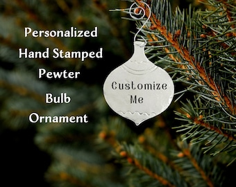 This pewter bulb ornament is a beautiful and festive way to show your holiday spirit! Customized with a hand-stamped message/decorated!